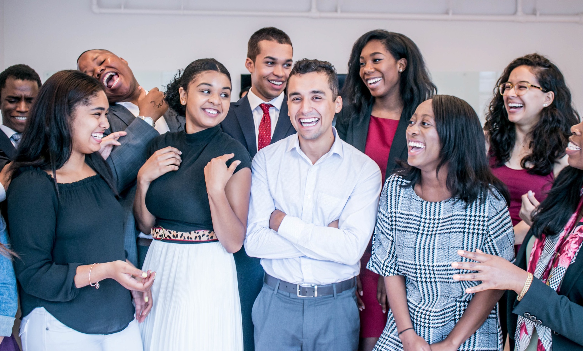 A globally diverse CareerBuddy team — colleagues from Africa collaborating around a laptop